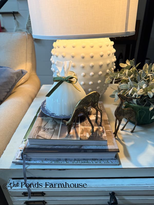 vintage milk glass lampshade on blue & white plate for upcycled tissue holder