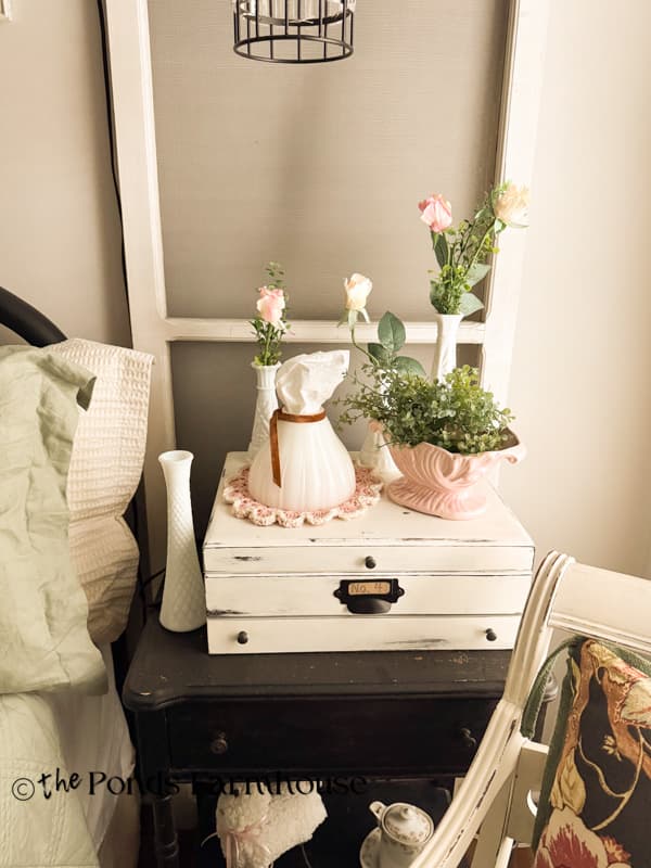 vintage milk glass lampshade upcycled as tissue holder on DIY doily.
