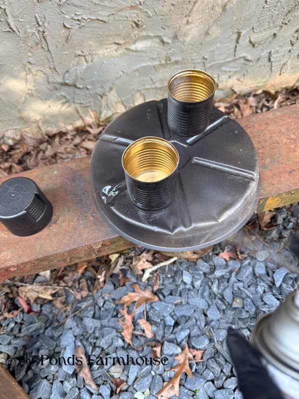 spray paint tin cans with gold inside and dark outside.